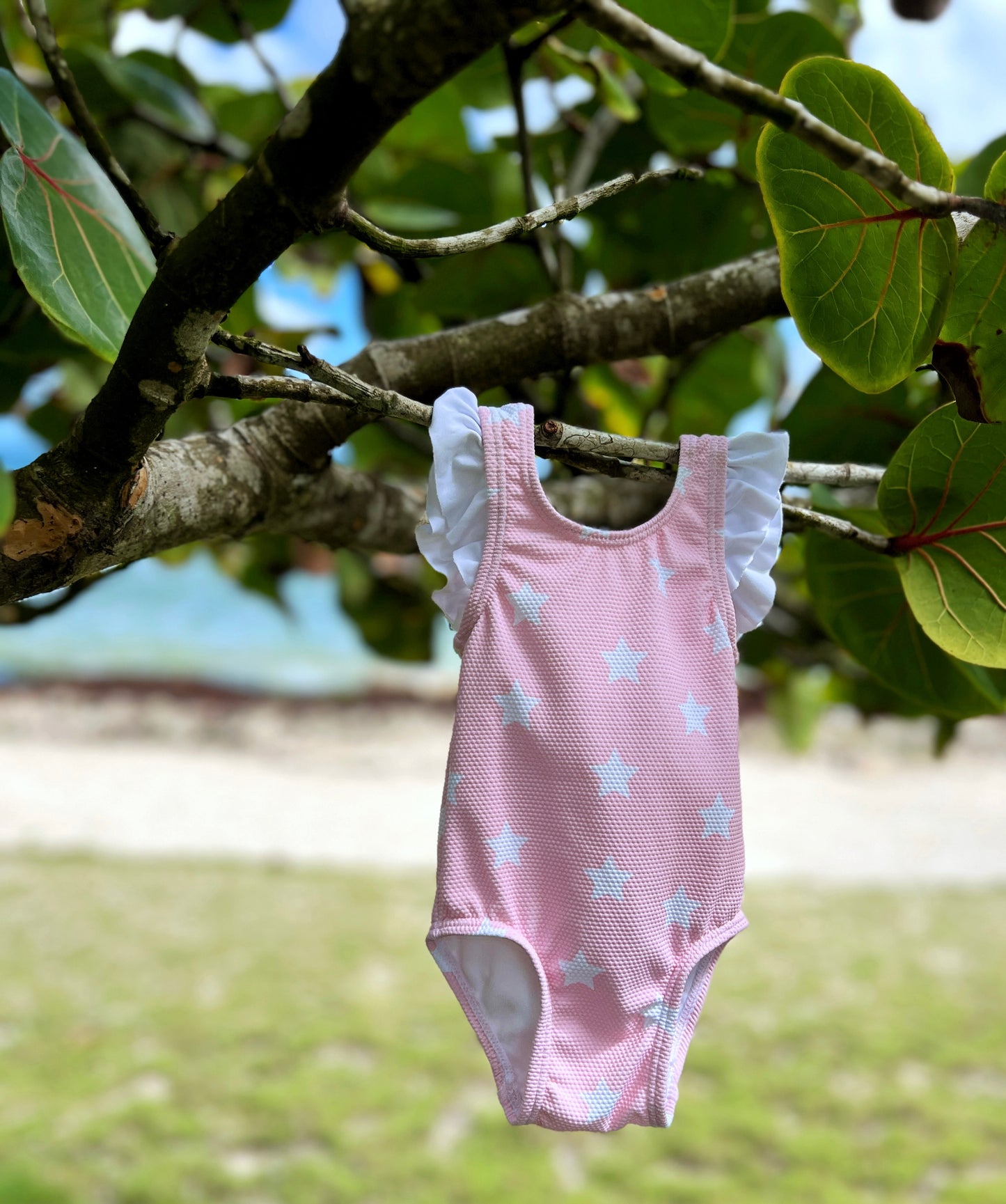 BAÑADOR BEBÉ ROSA CON VOLANTE